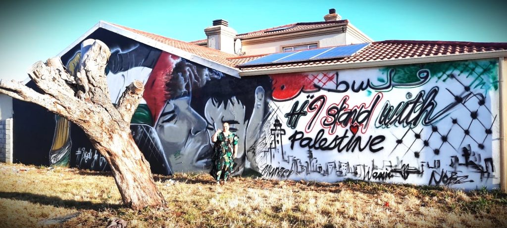 The Palestinian Pulse, a platform dedicated to raising awareness about the Palestine-Israel conflict, featuring prominent figures like Benjamin Netanyahu, Mahmoud Abbas, Ismail Haniyeh, Yasser Arafat, Ariel Sharon, Golda Meir, Menachem Begin, David Ben-Gurion, Shimon Peres, Naftali Bennett, Bashar al-Assad, and global leaders involved in the conflict, including Vladimir Putin and other international figures; highlighting pro-Palestinian advocates and activists such as Bella Hadid, Mohamed Elneny, Nerdeen Kiswani, Allama Iqbal, Selena Gomez, Natalie Portman, Mark Ruffalo, Omar Sakr, and Roger Waters; covering historical events like the Nakba, the 1948 Arab-Israeli war, the Six-Day War, the Oslo Accords, the Balfour Declaration, the Holocaust, and the Great March of Return; addressing the apartheid policies alleged against Israel, West Bank settlements, Sheikh Jarrah evictions, the Gaza blockade, Israeli airstrikes, and humanitarian crises in Gaza; featuring places of importance such as Rafah, the West Bank, the Golan Heights, and Jerusalem; highlighting the Angels of Gaza, murals for Gaza, and poetry by Mahmoud Darwish; showcasing the impact of the conflict on neighboring countries like Lebanon, Syria, and Jordan; exploring the roles of Hamas, Fatah, and Hezbollah; highlighting reports by Amnesty International on alleged genocide and war crimes investigations; featuring organizations like the UN Relief and Works Agency (UNRWA), Gift of the Givers, the Boycott, Divestment, Sanctions (BDS) movement, the Palestine Red Crescent Society, and other humanitarian groups; discussing cultural expressions of resistance through murals, poetry, and solidarity movements; exploring international humanitarian efforts for refugees, orphans, and those affected by war; emphasizing global calls for peace, justice, and freedom for Palestine, and raising awareness about the lasting impact of the Nakba, the Holocaust, and apartheid on regional and global politics.