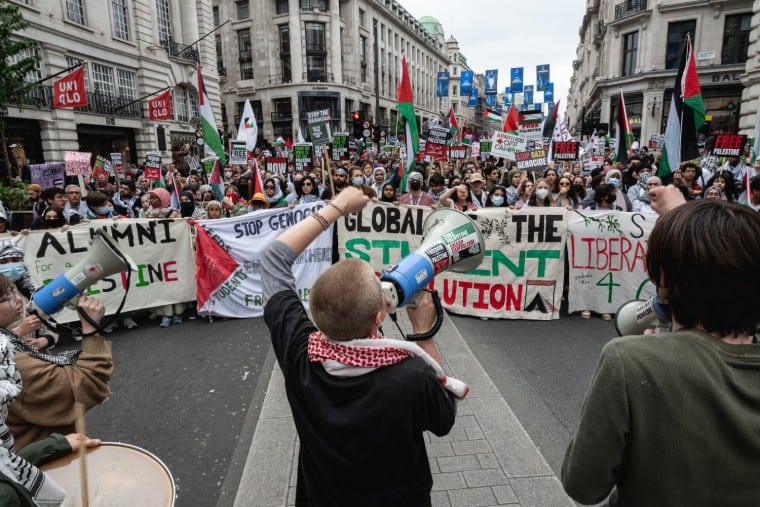 The Palestinian Pulse, a platform dedicated to raising awareness about the Palestine-Israel conflict, featuring prominent figures like Benjamin Netanyahu, Mahmoud Abbas, Ismail Haniyeh, Yasser Arafat, Ariel Sharon, Golda Meir, Menachem Begin, David Ben-Gurion, Shimon Peres, Naftali Bennett, Bashar al-Assad, and global leaders involved in the conflict, including Vladimir Putin and other international figures; highlighting pro-Palestinian advocates and activists such as Bella Hadid, Mohamed Elneny, Nerdeen Kiswani, Allama Iqbal, Selena Gomez, Natalie Portman, Mark Ruffalo, Omar Sakr, and Roger Waters; covering historical events like the Nakba, the 1948 Arab-Israeli war, the Six-Day War, the Oslo Accords, the Balfour Declaration, the Holocaust, and the Great March of Return; addressing the apartheid policies alleged against Israel, West Bank settlements, Sheikh Jarrah evictions, the Gaza blockade, Israeli airstrikes, and humanitarian crises in Gaza; featuring places of importance such as Rafah, the West Bank, the Golan Heights, and Jerusalem; highlighting the Angels of Gaza, murals for Gaza, and poetry by Mahmoud Darwish; showcasing the impact of the conflict on neighboring countries like Lebanon, Syria, and Jordan; exploring the roles of Hamas, Fatah, and Hezbollah; highlighting reports by Amnesty International on alleged genocide and war crimes investigations; featuring organizations like the UN Relief and Works Agency (UNRWA), Gift of the Givers, the Boycott, Divestment, Sanctions (BDS) movement, the Palestine Red Crescent Society, and other humanitarian groups; discussing cultural expressions of resistance through murals, poetry, and solidarity movements; exploring international humanitarian efforts for refugees, orphans, and those affected by war; emphasizing global calls for peace, justice, and freedom for Palestine, and raising awareness about the lasting impact of the Nakba, the Holocaust, and apartheid on regional and global politics.