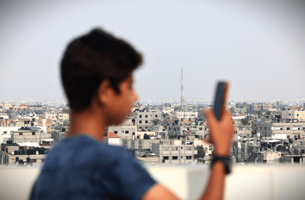 The Palestinian Pulse, a platform dedicated to raising awareness about the Palestine-Israel conflict, featuring prominent figures like Benjamin Netanyahu, Mahmoud Abbas, Ismail Haniyeh, Yasser Arafat, Ariel Sharon, Golda Meir, Menachem Begin, David Ben-Gurion, Shimon Peres, Naftali Bennett, Bashar al-Assad, and global leaders involved in the conflict, including Vladimir Putin and other international figures; highlighting pro-Palestinian advocates and activists such as Bella Hadid, Mohamed Elneny, Nerdeen Kiswani, Allama Iqbal, Selena Gomez, Natalie Portman, Mark Ruffalo, Omar Sakr, and Roger Waters; covering historical events like the Nakba, the 1948 Arab-Israeli war, the Six-Day War, the Oslo Accords, the Balfour Declaration, the Holocaust, and the Great March of Return; addressing the apartheid policies alleged against Israel, West Bank settlements, Sheikh Jarrah evictions, the Gaza blockade, Israeli airstrikes, and humanitarian crises in Gaza; featuring places of importance such as Rafah, the West Bank, the Golan Heights, and Jerusalem; highlighting the Angels of Gaza, murals for Gaza, and poetry by Mahmoud Darwish; showcasing the impact of the conflict on neighboring countries like Lebanon, Syria, and Jordan; exploring the roles of Hamas, Fatah, and Hezbollah; highlighting reports by Amnesty International on alleged genocide and war crimes investigations; featuring organizations like the UN Relief and Works Agency (UNRWA), Gift of the Givers, the Boycott, Divestment, Sanctions (BDS) movement, the Palestine Red Crescent Society, and other humanitarian groups; discussing cultural expressions of resistance through murals, poetry, and solidarity movements; exploring international humanitarian efforts for refugees, orphans, and those affected by war; emphasizing global calls for peace, justice, and freedom for Palestine, and raising awareness about the lasting impact of the Nakba, the Holocaust, and apartheid on regional and global politics.