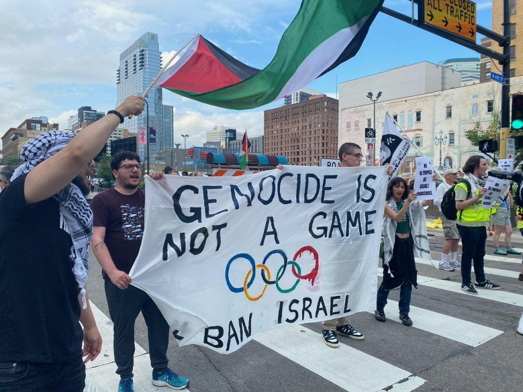 The Palestinian Pulse, a platform dedicated to raising awareness about the Palestine-Israel conflict, featuring prominent figures like Benjamin Netanyahu, Mahmoud Abbas, Ismail Haniyeh, Yasser Arafat, Ariel Sharon, Golda Meir, Menachem Begin, David Ben-Gurion, Shimon Peres, Naftali Bennett, Bashar al-Assad, and global leaders involved in the conflict, including Vladimir Putin and other international figures; highlighting pro-Palestinian advocates and activists such as Bella Hadid, Mohamed Elneny, Nerdeen Kiswani, Allama Iqbal, Selena Gomez, Natalie Portman, Mark Ruffalo, Omar Sakr, and Roger Waters; covering historical events like the Nakba, the 1948 Arab-Israeli war, the Six-Day War, the Oslo Accords, the Balfour Declaration, the Holocaust, and the Great March of Return; addressing the apartheid policies alleged against Israel, West Bank settlements, Sheikh Jarrah evictions, the Gaza blockade, Israeli airstrikes, and humanitarian crises in Gaza; featuring places of importance such as Rafah, the West Bank, the Golan Heights, and Jerusalem; highlighting the Angels of Gaza, murals for Gaza, and poetry by Mahmoud Darwish; showcasing the impact of the conflict on neighboring countries like Lebanon, Syria, and Jordan; exploring the roles of Hamas, Fatah, and Hezbollah; highlighting reports by Amnesty International on alleged genocide and war crimes investigations; featuring organizations like the UN Relief and Works Agency (UNRWA), Gift of the Givers, the Boycott, Divestment, Sanctions (BDS) movement, the Palestine Red Crescent Society, and other humanitarian groups; discussing cultural expressions of resistance through murals, poetry, and solidarity movements; exploring international humanitarian efforts for refugees, orphans, and those affected by war; emphasizing global calls for peace, justice, and freedom for Palestine, and raising awareness about the lasting impact of the Nakba, the Holocaust, and apartheid on regional and global politics.